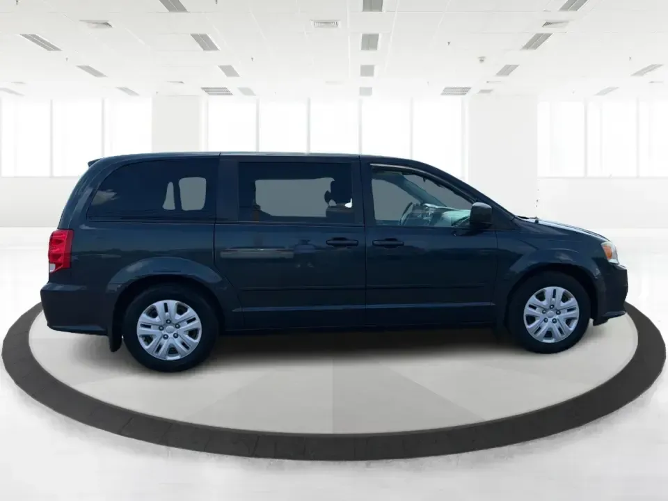 2014 Dodge Grand Caravan SE (2C4RDGBG0ER) with an 3.6L V-6 DOHC engine, located at 1099 N County Rd 25A, Troy, OH, 45373, (937) 908-9800, 40.057079, -84.212883 - Need a reliable, budget-friendly minivan that can handle school drop-offs, grocery runs, and weekend road trips without complicating your routine? This 2014 Dodge Grand Caravan SE in Maximum Steel Metallic Clearcoat is a practical, family-first van with the space and everyday comfort that make life- Photo#1