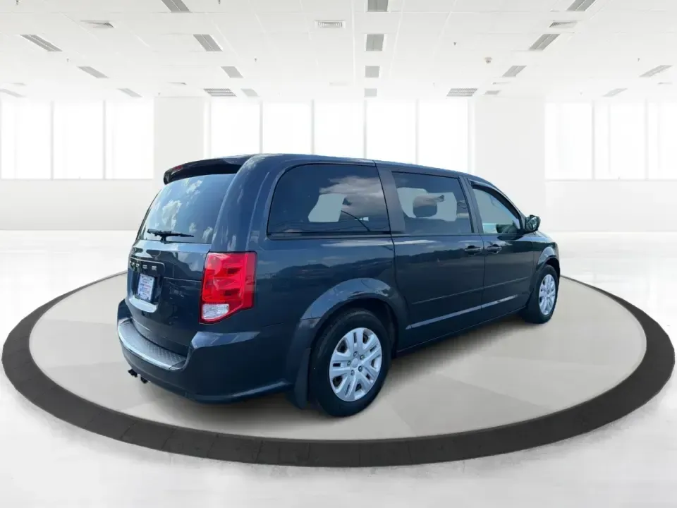 2014 Dodge Grand Caravan SE (2C4RDGBG0ER) with an 3.6L V-6 DOHC engine, located at 1099 N County Rd 25A, Troy, OH, 45373, (937) 908-9800, 40.057079, -84.212883 - Need a reliable, budget-friendly minivan that can handle school drop-offs, grocery runs, and weekend road trips without complicating your routine? This 2014 Dodge Grand Caravan SE in Maximum Steel Metallic Clearcoat is a practical, family-first van with the space and everyday comfort that make life- Photo#2