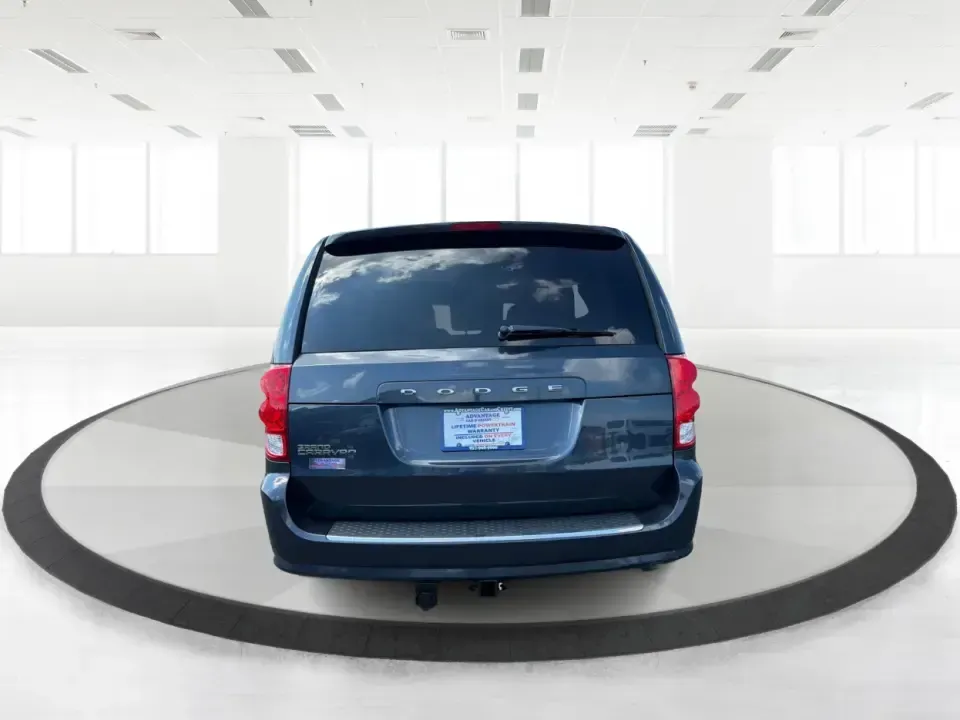 2014 Dodge Grand Caravan SE (2C4RDGBG0ER) with an 3.6L V-6 DOHC engine, located at 1099 N County Rd 25A, Troy, OH, 45373, (937) 908-9800, 40.057079, -84.212883 - Need a reliable, budget-friendly minivan that can handle school drop-offs, grocery runs, and weekend road trips without complicating your routine? This 2014 Dodge Grand Caravan SE in Maximum Steel Metallic Clearcoat is a practical, family-first van with the space and everyday comfort that make life- Photo#3