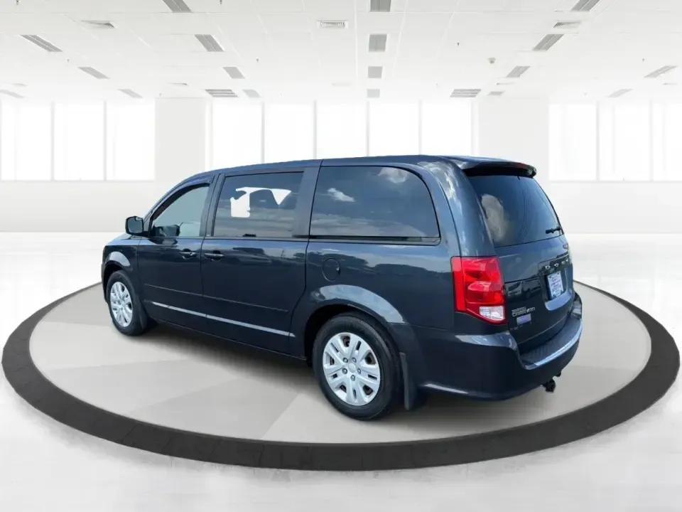 2014 Dodge Grand Caravan SE (2C4RDGBG0ER) with an 3.6L V-6 DOHC engine, located at 1099 N County Rd 25A, Troy, OH, 45373, (937) 908-9800, 40.057079, -84.212883 - Need a reliable, budget-friendly minivan that can handle school drop-offs, grocery runs, and weekend road trips without complicating your routine? This 2014 Dodge Grand Caravan SE in Maximum Steel Metallic Clearcoat is a practical, family-first van with the space and everyday comfort that make life- Photo#4