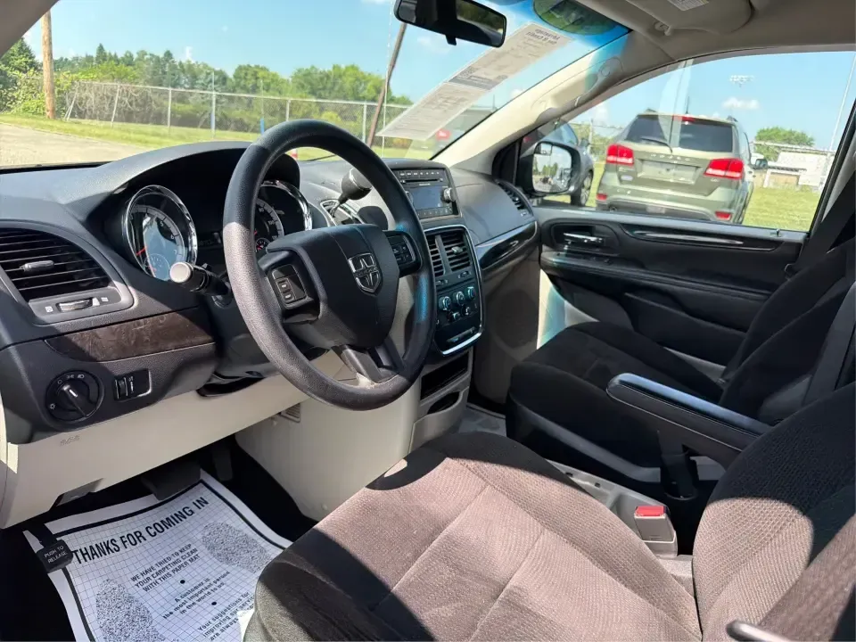 2014 Dodge Grand Caravan SE (2C4RDGBG0ER) with an 3.6L V-6 DOHC engine, located at 1099 N County Rd 25A, Troy, OH, 45373, (937) 908-9800, 40.057079, -84.212883 - Need a reliable, budget-friendly minivan that can handle school drop-offs, grocery runs, and weekend road trips without complicating your routine? This 2014 Dodge Grand Caravan SE in Maximum Steel Metallic Clearcoat is a practical, family-first van with the space and everyday comfort that make life- Photo#9