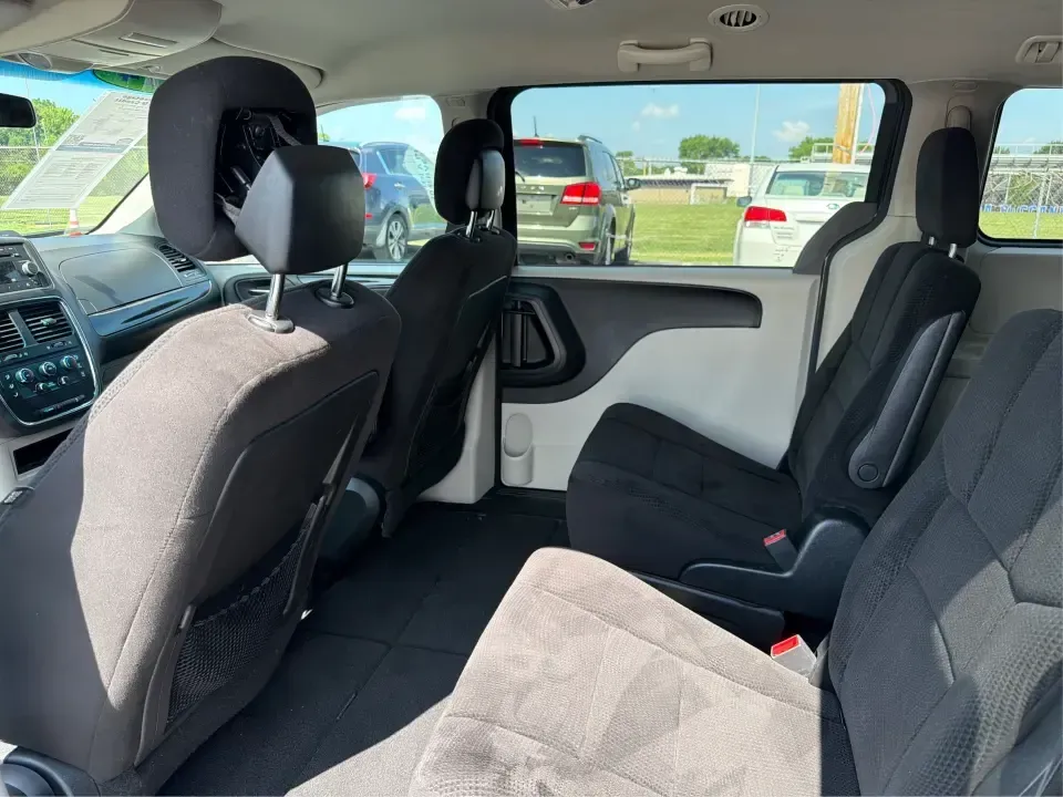 2014 Dodge Grand Caravan SE (2C4RDGBG0ER) with an 3.6L V-6 DOHC engine, located at 1099 N County Rd 25A, Troy, OH, 45373, (937) 908-9800, 40.057079, -84.212883 - Need a reliable, budget-friendly minivan that can handle school drop-offs, grocery runs, and weekend road trips without complicating your routine? This 2014 Dodge Grand Caravan SE in Maximum Steel Metallic Clearcoat is a practical, family-first van with the space and everyday comfort that make life- Photo#10