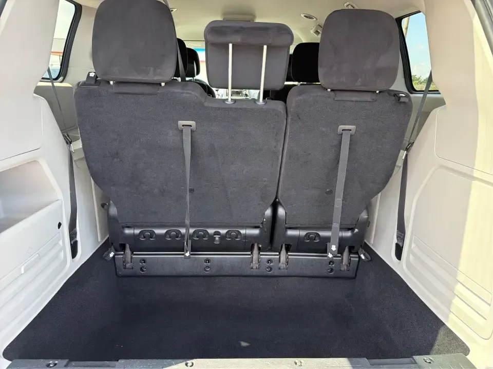 2014 Dodge Grand Caravan SE (2C4RDGBG0ER) with an 3.6L V-6 DOHC engine, located at 1099 N County Rd 25A, Troy, OH, 45373, (937) 908-9800, 40.057079, -84.212883 - Need a reliable, budget-friendly minivan that can handle school drop-offs, grocery runs, and weekend road trips without complicating your routine? This 2014 Dodge Grand Caravan SE in Maximum Steel Metallic Clearcoat is a practical, family-first van with the space and everyday comfort that make life- Photo#12