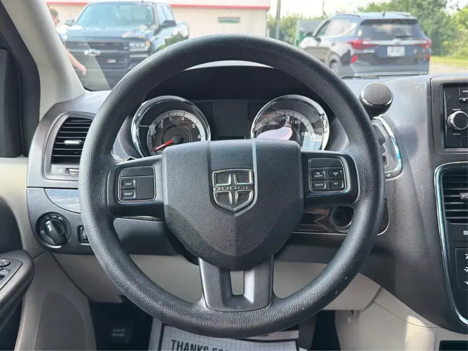 2014 Dodge Grand Caravan SE (2C4RDGBG0ER) with an 3.6L V-6 DOHC engine, located at 1099 N County Rd 25A, Troy, OH, 45373, (937) 908-9800, 40.057079, -84.212883 - Need a reliable, budget-friendly minivan that can handle school drop-offs, grocery runs, and weekend road trips without complicating your routine? This 2014 Dodge Grand Caravan SE in Maximum Steel Metallic Clearcoat is a practical, family-first van with the space and everyday comfort that make life- Photo#16