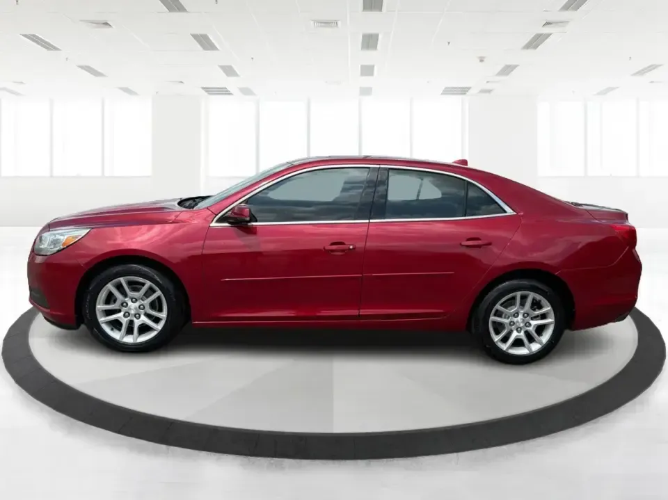 2013 Chevrolet Malibu 1LT (1G11C5SA3DF) with an ECOTEC 2.5L I-4 gasoline direct injection engine, located at 8750 N County Rd 25A, Piqua, OH, 45356, (937) 908-9800, 40.164391, -84.232513 - Need a dependable sedan for the daily commute up I75, school drop-offs, or quick weekend getaways to Miami Bend Park? This 2013 Chevrolet Malibu 1LT in eye-catching Crystal Red Tintcoat fits real-life Ohio driving with a comfortable cabin, smart safety tech, and efficient power-making it a practical- Photo#5