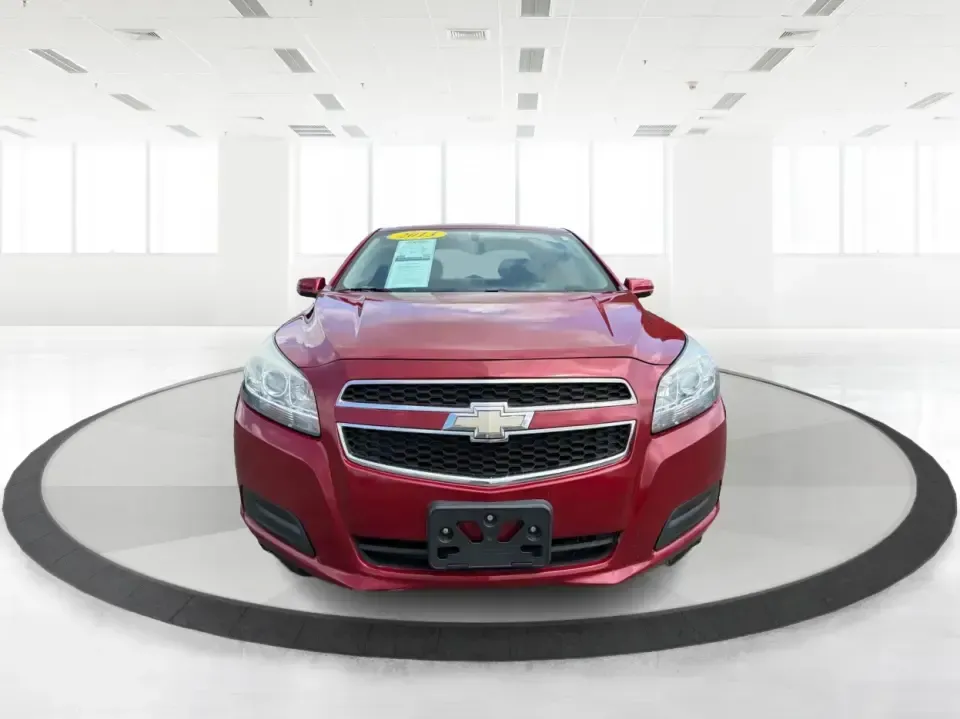 2013 Chevrolet Malibu 1LT (1G11C5SA3DF) with an ECOTEC 2.5L I-4 gasoline direct injection engine, located at 8750 N County Rd 25A, Piqua, OH, 45356, (937) 908-9800, 40.164391, -84.232513 - Need a dependable sedan for the daily commute up I75, school drop-offs, or quick weekend getaways to Miami Bend Park? This 2013 Chevrolet Malibu 1LT in eye-catching Crystal Red Tintcoat fits real-life Ohio driving with a comfortable cabin, smart safety tech, and efficient power-making it a practical- Photo#7