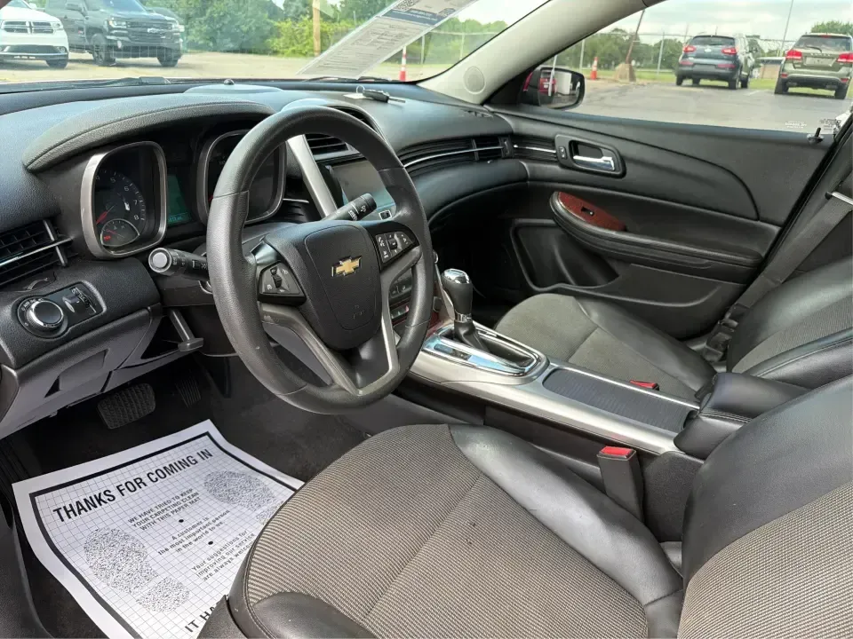 2013 Chevrolet Malibu 1LT (1G11C5SA3DF) with an ECOTEC 2.5L I-4 gasoline direct injection engine, located at 8750 N County Rd 25A, Piqua, OH, 45356, (937) 908-9800, 40.164391, -84.232513 - Need a dependable sedan for the daily commute up I75, school drop-offs, or quick weekend getaways to Miami Bend Park? This 2013 Chevrolet Malibu 1LT in eye-catching Crystal Red Tintcoat fits real-life Ohio driving with a comfortable cabin, smart safety tech, and efficient power-making it a practical- Photo#9