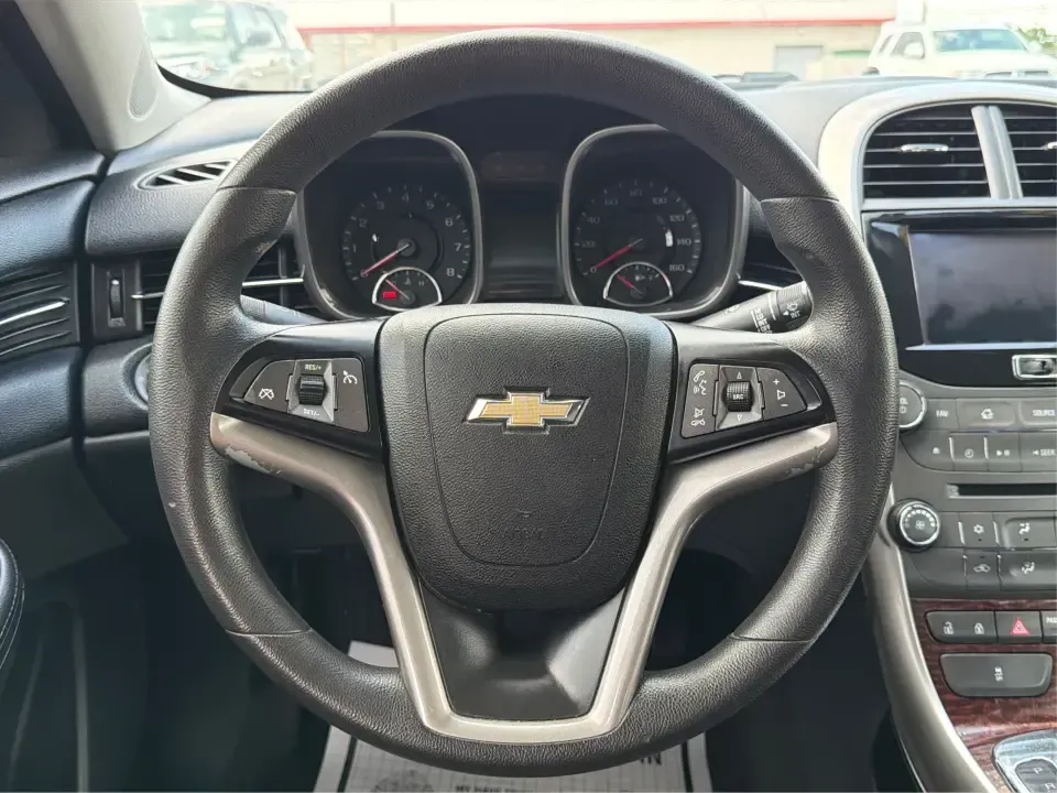 2013 Chevrolet Malibu 1LT (1G11C5SA3DF) with an ECOTEC 2.5L I-4 gasoline direct injection engine, located at 8750 N County Rd 25A, Piqua, OH, 45356, (937) 908-9800, 40.164391, -84.232513 - Need a dependable sedan for the daily commute up I75, school drop-offs, or quick weekend getaways to Miami Bend Park? This 2013 Chevrolet Malibu 1LT in eye-catching Crystal Red Tintcoat fits real-life Ohio driving with a comfortable cabin, smart safety tech, and efficient power-making it a practical- Photo#16