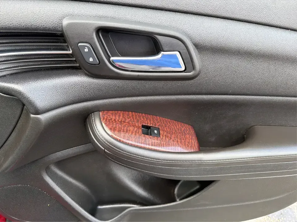 2013 Chevrolet Malibu 1LT (1G11C5SA3DF) with an ECOTEC 2.5L I-4 gasoline direct injection engine, located at 8750 N County Rd 25A, Piqua, OH, 45356, (937) 908-9800, 40.164391, -84.232513 - Need a dependable sedan for the daily commute up I75, school drop-offs, or quick weekend getaways to Miami Bend Park? This 2013 Chevrolet Malibu 1LT in eye-catching Crystal Red Tintcoat fits real-life Ohio driving with a comfortable cabin, smart safety tech, and efficient power-making it a practical- Photo#20