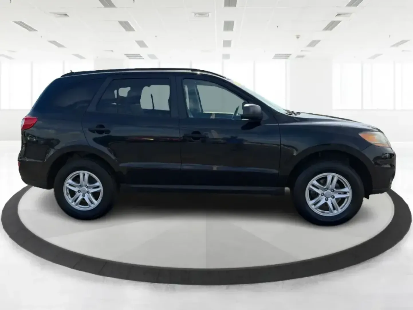 2011 Hyundai Santa Fe GL(Middle-low grade) (5XYZG3AB9BG) with an 2.4L I-4 DOHC engine, located at 1099 N County Rd 25A, Troy, OH, 45373, (937) 908-9800, 40.057079, -84.212883 - Weekend getaways to Hocking Hills, daily commutes down I75, or the after-school shuttle with sports gear in the back-this 2011 Hyundai Santa Fe GL is the kind of SUV that fits real life in and around Troy. With its practical size, confident road manners, and versatile cargo space, it's a smart pick- Photo#1