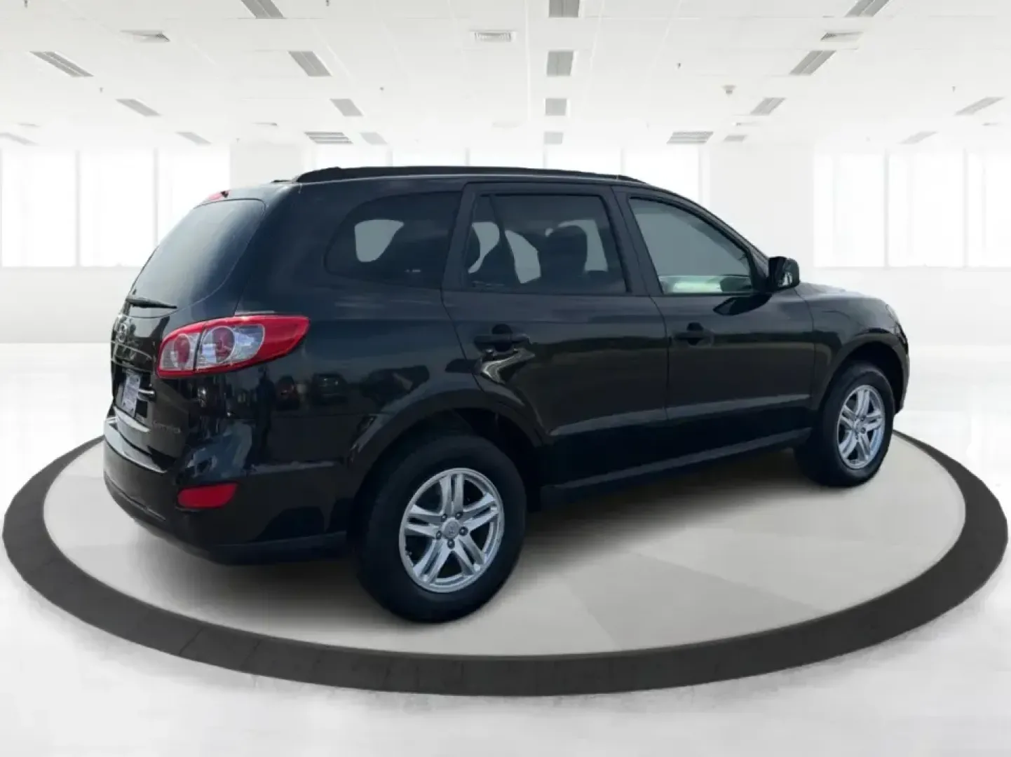2011 Hyundai Santa Fe GL(Middle-low grade) (5XYZG3AB9BG) with an 2.4L I-4 DOHC engine, located at 1099 N County Rd 25A, Troy, OH, 45373, (937) 908-9800, 40.057079, -84.212883 - Weekend getaways to Hocking Hills, daily commutes down I75, or the after-school shuttle with sports gear in the back-this 2011 Hyundai Santa Fe GL is the kind of SUV that fits real life in and around Troy. With its practical size, confident road manners, and versatile cargo space, it's a smart pick- Photo#2