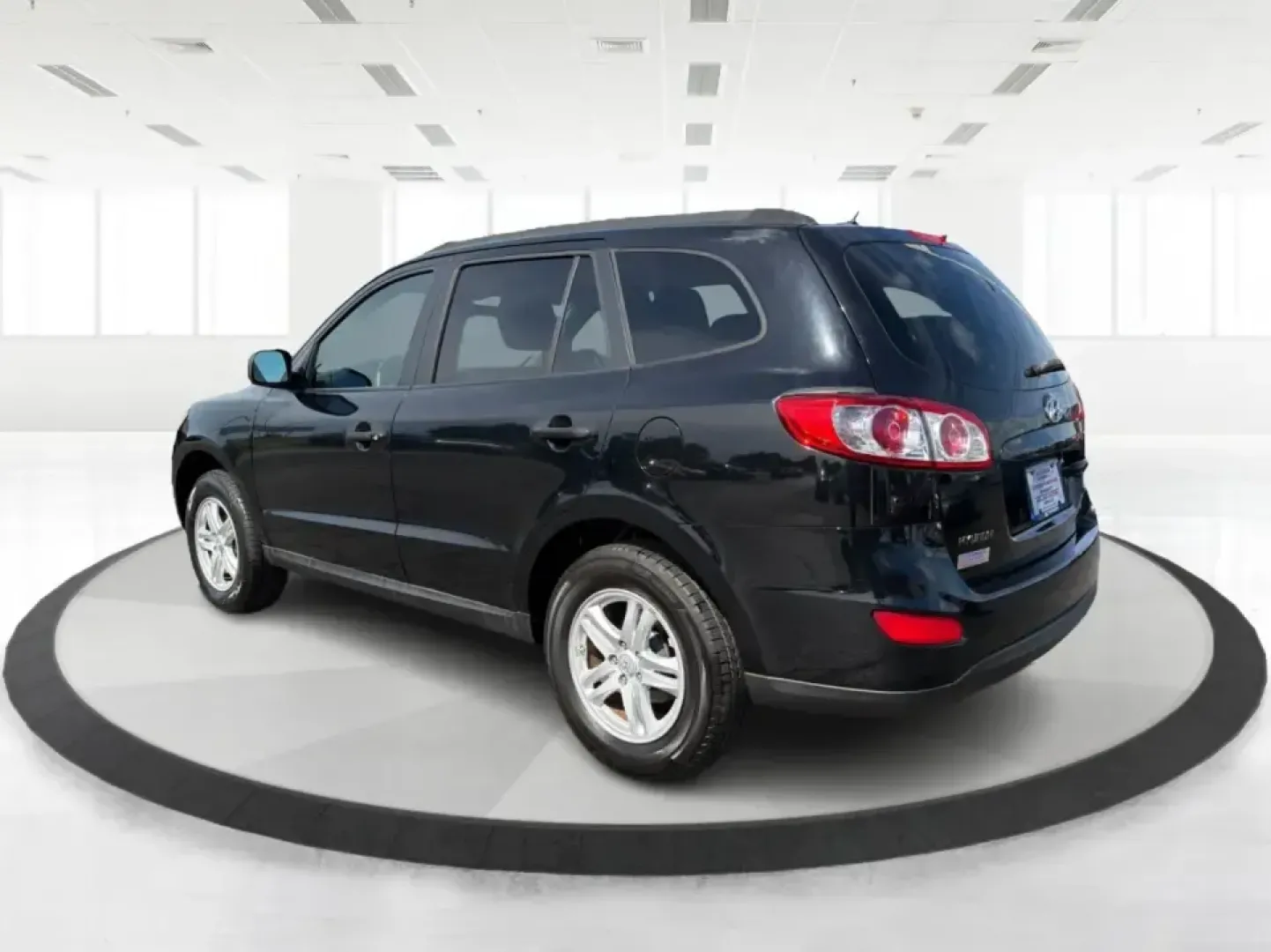 2011 Hyundai Santa Fe GL(Middle-low grade) (5XYZG3AB9BG) with an 2.4L I-4 DOHC engine, located at 1099 N County Rd 25A, Troy, OH, 45373, (937) 908-9800, 40.057079, -84.212883 - Weekend getaways to Hocking Hills, daily commutes down I75, or the after-school shuttle with sports gear in the back-this 2011 Hyundai Santa Fe GL is the kind of SUV that fits real life in and around Troy. With its practical size, confident road manners, and versatile cargo space, it's a smart pick- Photo#4