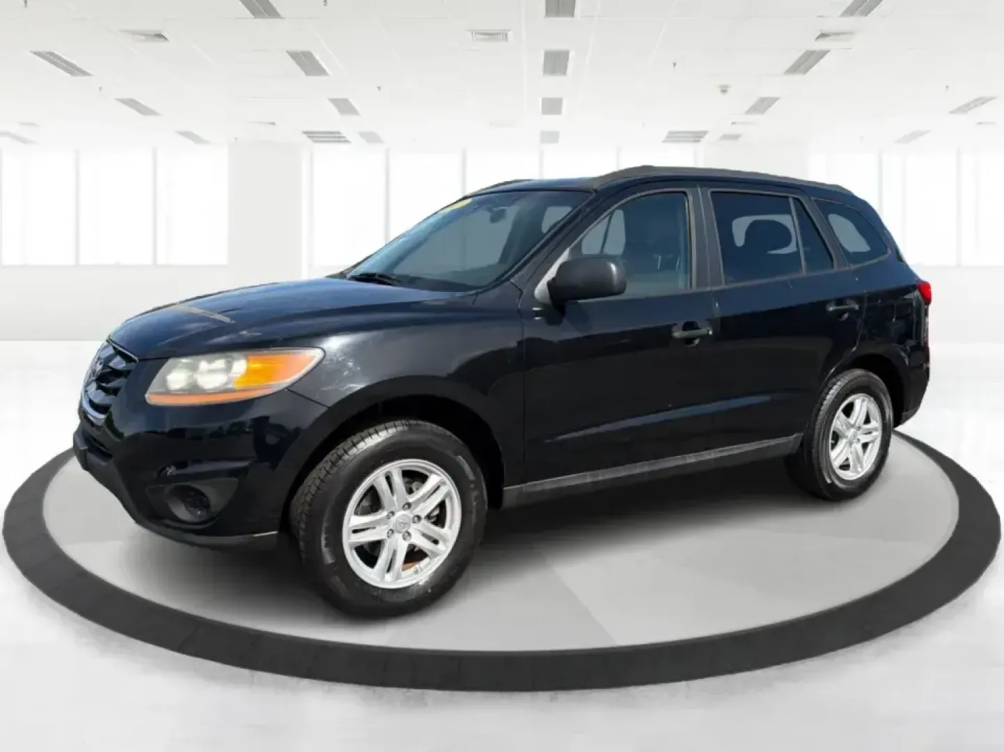 2011 Hyundai Santa Fe GL(Middle-low grade) (5XYZG3AB9BG) with an 2.4L I-4 DOHC engine, located at 1099 N County Rd 25A, Troy, OH, 45373, (937) 908-9800, 40.057079, -84.212883 - Weekend getaways to Hocking Hills, daily commutes down I75, or the after-school shuttle with sports gear in the back-this 2011 Hyundai Santa Fe GL is the kind of SUV that fits real life in and around Troy. With its practical size, confident road manners, and versatile cargo space, it's a smart pick- Photo#8
