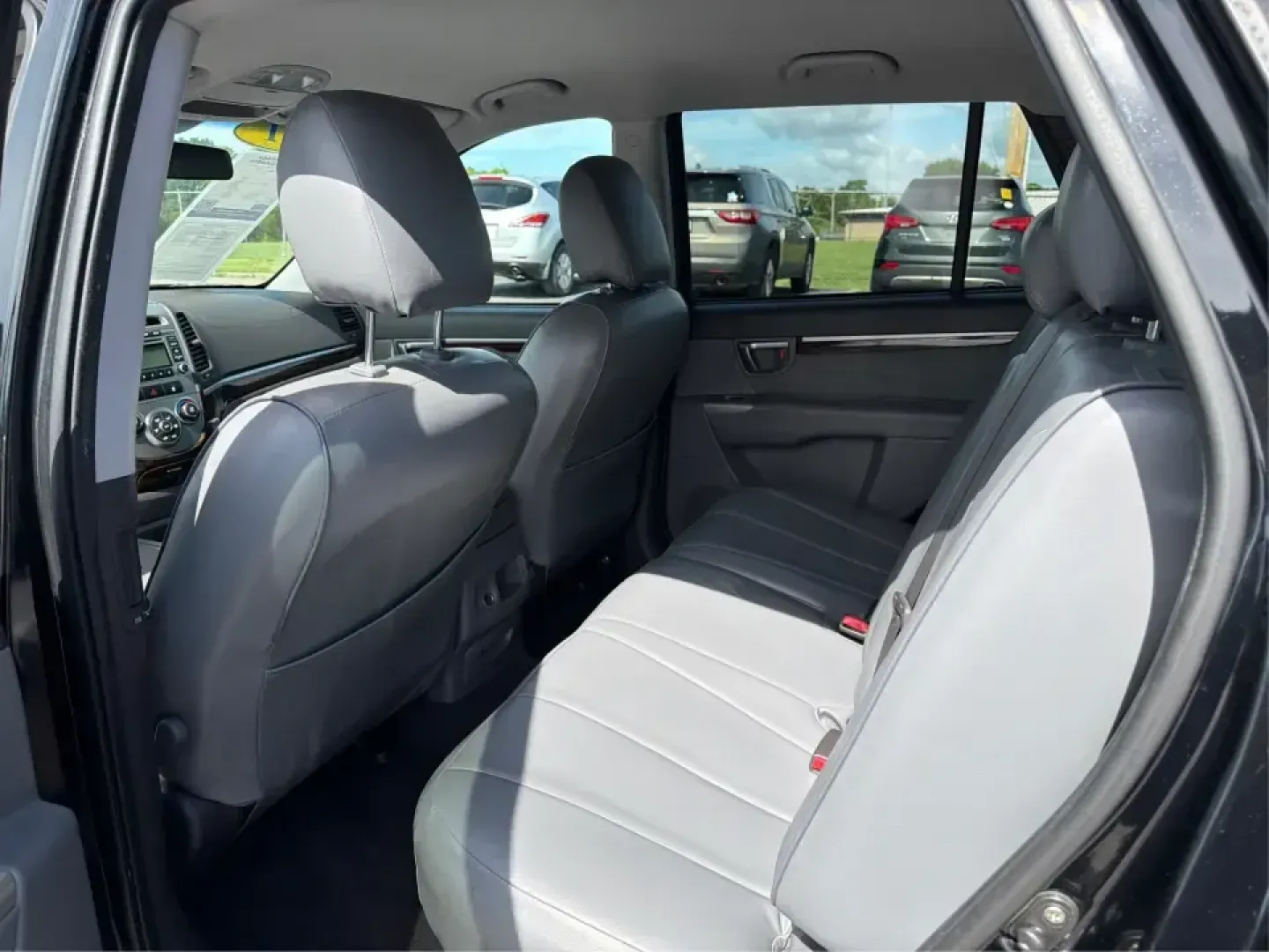 2011 Hyundai Santa Fe GL(Middle-low grade) (5XYZG3AB9BG) with an 2.4L I-4 DOHC engine, located at 1099 N County Rd 25A, Troy, OH, 45373, (937) 908-9800, 40.057079, -84.212883 - Weekend getaways to Hocking Hills, daily commutes down I75, or the after-school shuttle with sports gear in the back-this 2011 Hyundai Santa Fe GL is the kind of SUV that fits real life in and around Troy. With its practical size, confident road manners, and versatile cargo space, it's a smart pick- Photo#10