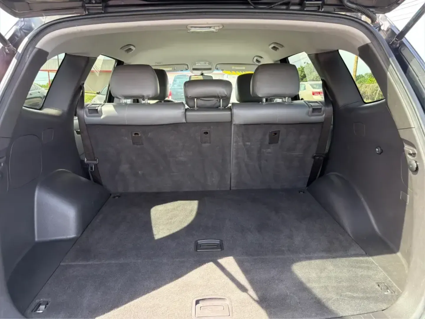 2011 Hyundai Santa Fe GL(Middle-low grade) (5XYZG3AB9BG) with an 2.4L I-4 DOHC engine, located at 1099 N County Rd 25A, Troy, OH, 45373, (937) 908-9800, 40.057079, -84.212883 - Weekend getaways to Hocking Hills, daily commutes down I75, or the after-school shuttle with sports gear in the back-this 2011 Hyundai Santa Fe GL is the kind of SUV that fits real life in and around Troy. With its practical size, confident road manners, and versatile cargo space, it's a smart pick- Photo#11