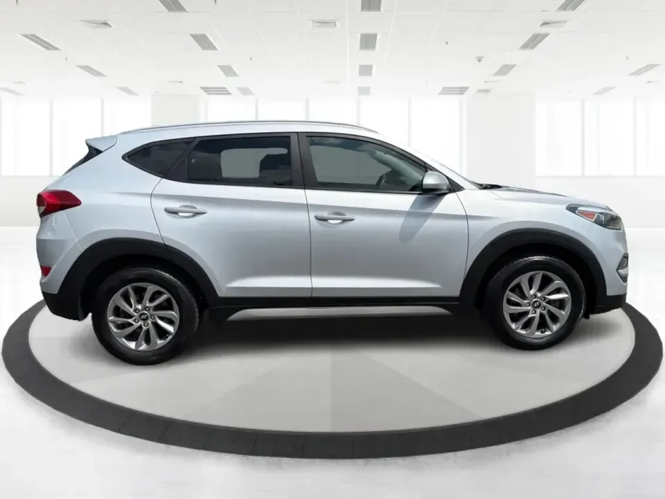 2018 Hyundai Tucson SE Pop, SE Plus, Eco, Sport, Value, Ultimate Base/Ultimate (KM8J3CA46JU) with an Nu 2L I-4 gasoline direct injection engine, Automatic transmission, located at 401 Woodman Dr, Riverside, OH, 45431, (937) 908-9800, 39.760899, -84.123421 - Weekend road trips to Yellow Springs, snowy commutes on I-675, and everyday school-and-grocery runs around Riverside all call for an SUV that feels confident, comfortable, and easy to live with-and this 2018 Hyundai Tucson is built for exactly that kind of real-life driving. Finished in sleek Molten- Photo#1