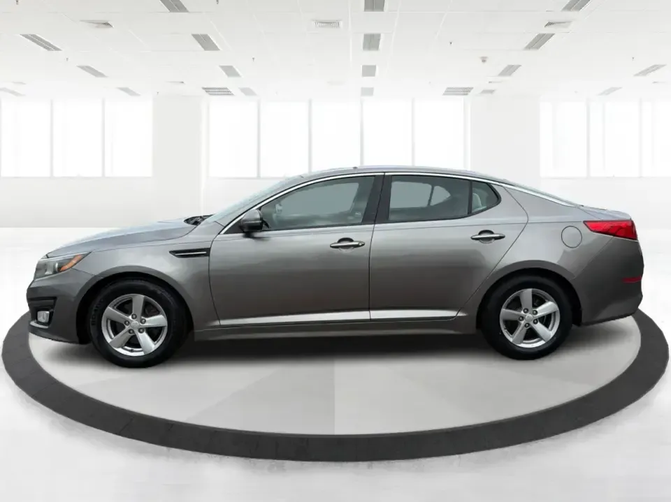 2014 Kia Optima 2.4 LX STD/Conv (5XXGM4A77EG) with an Theta II 2.4L I-4 gasoline direct injection engine, located at 8750 N County Rd 25A, Piqua, OH, 45356, (937) 908-9800, 40.164391, -84.232513 - Picture your next week: a smooth, fuel-sipping commute down I-75, a quick run to Miami Valley Centre Mall, and a comfortable evening drive through downtown Piqua-without giving up style or practicality. This 2014 Kia Optima 2.4 LX (STD/Conv) in Satin Metal is a smart sedan for real life: roomy enoug- Photo#5