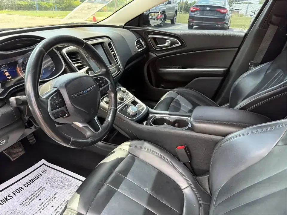 2015 Chrysler 200 200C (1C3CCCCGXFN) with an Other engine, located at 1230 East Main St, Xenia, OH, 45385, (937) 908-9800, 39.688026, -83.910172 - Slip into a comfortable, upscale sedan that fits real life in Xenia-school drop-offs, the daily commute down US-35, and weekend errands between Downtown Xenia and the Greene Towne Center. This 2015 Chrysler 200C in Black Clearcoat blends a refined cabin with practical four-door versatility, making i- Photo#9