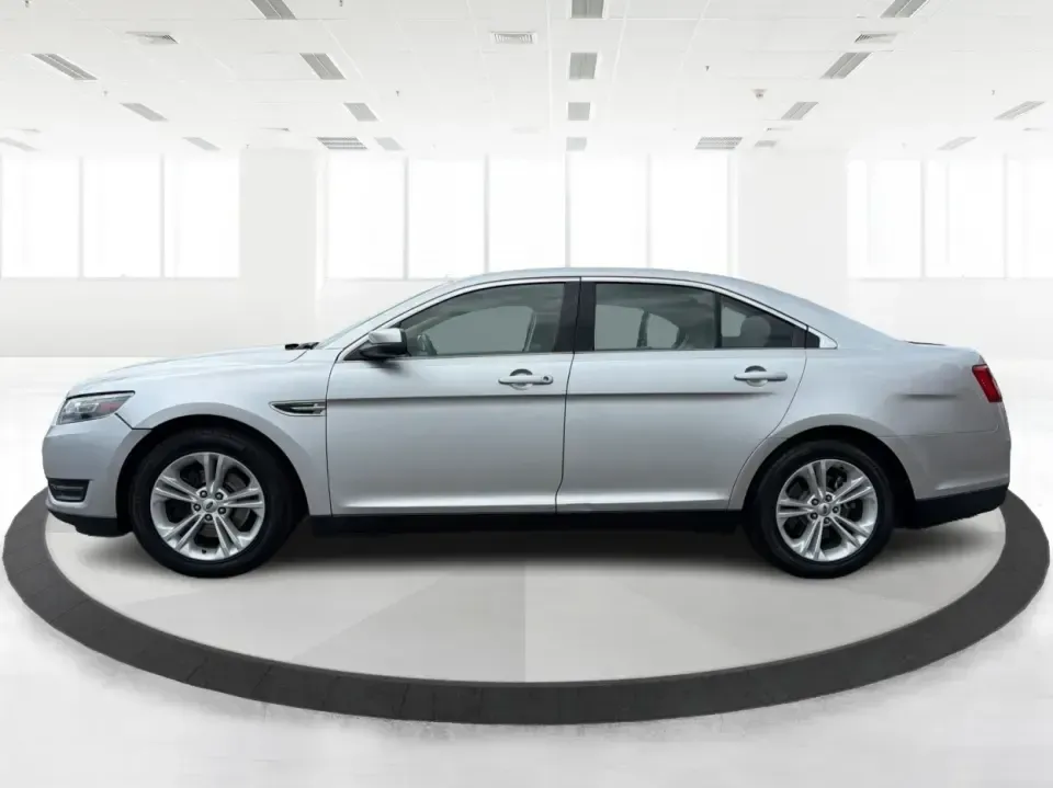 2014 Ford Taurus SEL (1FAHP2E84EG) with an EcoBoost 2L I-4 gasoline direct injection engine, located at 401 Woodman Dr, Riverside, OH, 45431, (937) 908-9800, 39.760899, -84.123421 - Need a comfortable, confident commuter that can handle I75 traffic during the week and still feel relaxed on a Dayton-to-Cincinnati road trip on the weekend? This 2014 Ford Taurus SEL in Ingot Silver Metallic is a smart pick for drivers who want full-size sedan space, modern tech, and a smooth ride-- Photo#5