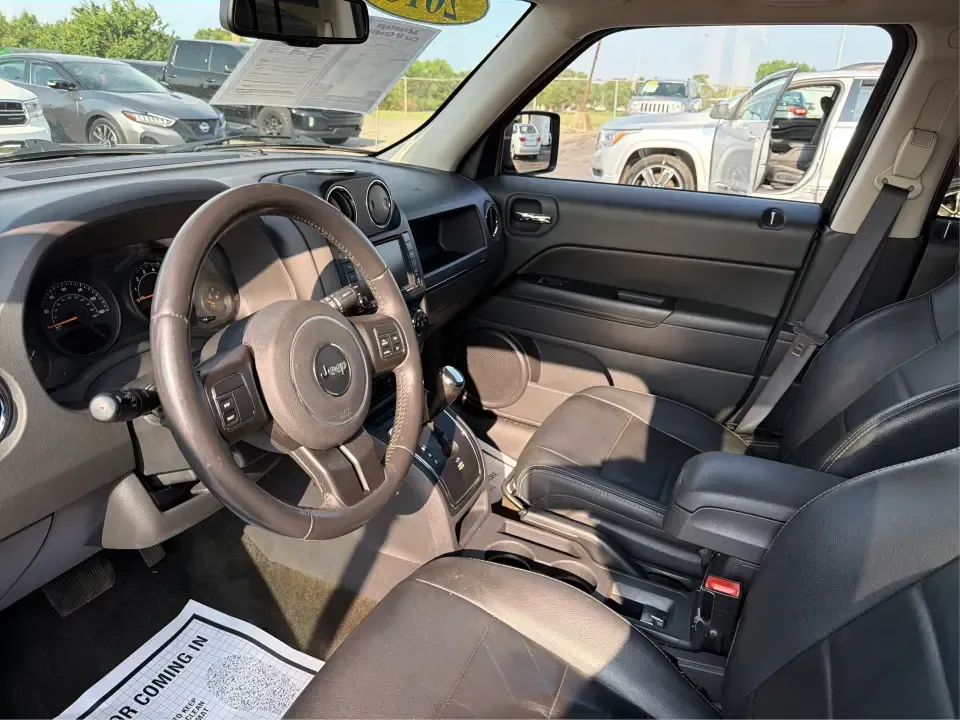 2016 Jeep Patriot Latitude (1C4NJRFB6GD) with an 2.4L I-4 DOHC engine, located at 1230 East Main St, Xenia, OH, 45385, (937) 908-9800, 39.688026, -83.910172 - Weekday commute on US-35, grocery runs through downtown Xenia, and spontaneous weekend escapes to John Bryan State Park or the bike trails near Yellow Springs-this 2016 Jeep Patriot Latitude is built for the kind of life that doesn't stay parked. With SUV versatility, confident 4WD/AWD capability, a- Photo#9