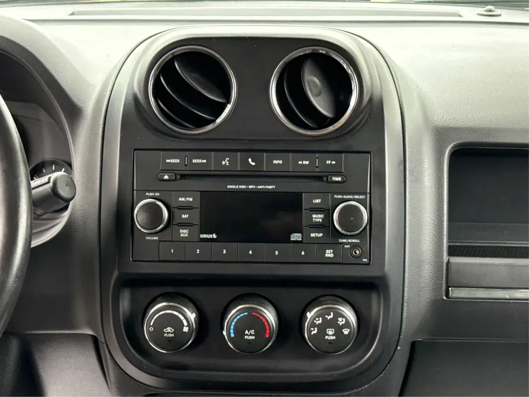 2016 Jeep Patriot High Altitude Edition (1C4NJRFB0GD) with an 2.4L I-4 DOHC engine, located at 4508 South Dixie Dr, Moraine, OH, 45439, (937) 908-9800, 39.689976, -84.218452 - 2016 Jeep Patriot High Altitude Edition - Photo#13