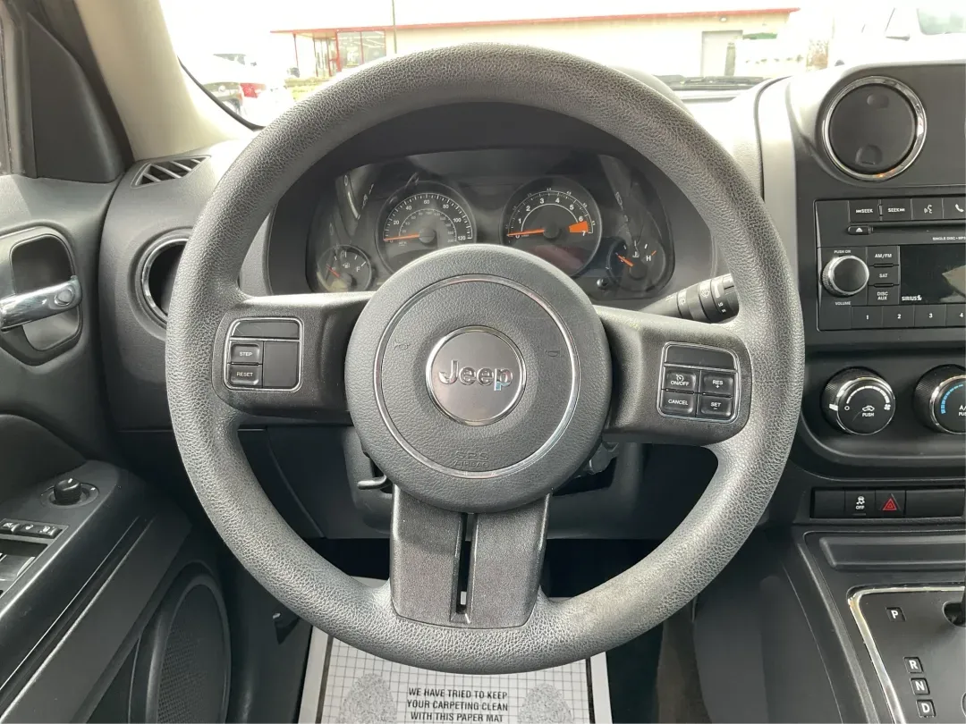 2017 Jeep Patriot Sport FWD (1C4NJPBAXHD) with an 2.4L I-4 DOHC engine, located at 8750 N County Rd 25A, Piqua, OH, 45356, (937) 908-9800, 40.164391, -84.232513 - 2017 Jeep Patriot Sport FWD - Photo#16