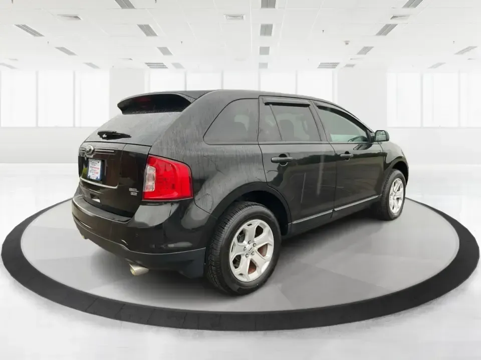 2013 Ford Edge SEL (2FMDK4JC1DB) with an 3.5L V-6 DOHC engine, 6-Speed Automatic transmission, located at 4508 South Dixie Dr, Moraine, OH, 45439, (937) 908-9800, 39.689976, -84.218452 - **Elevate Your Weekend Adventures with the 2013 Ford Edge SEL at Advantage Car and Credit!**<br /> <br /> Are you ready to embrace a lifestyle of comfort and adventure? Whether you're shuttling the kids to their weekend soccer games or embarking on a scenic road trip through Ohio's beautiful landsca - Photo#2
