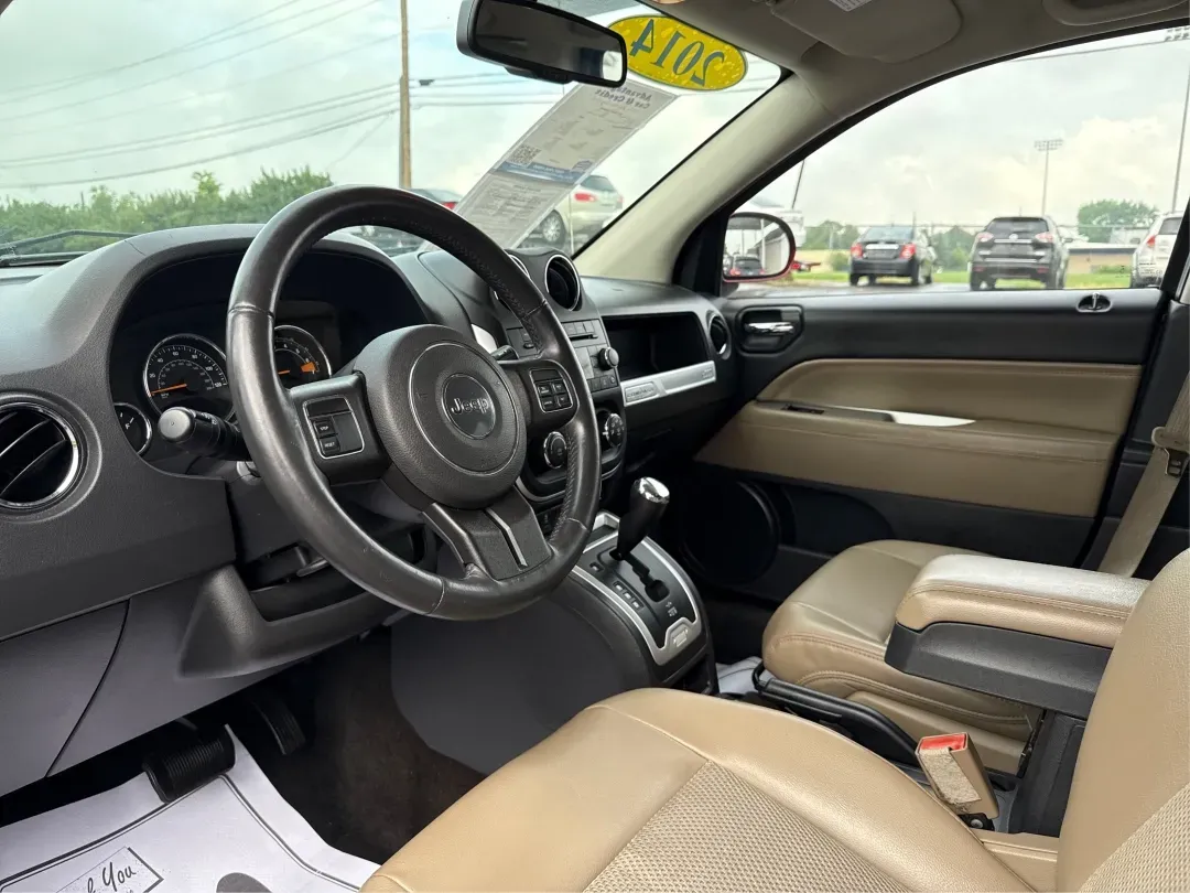 2014 Jeep Compass Latitude (1C4NJDEBXED) with an 2.4L I-4 DOHC engine, located at 1230 East Main St, Xenia, OH, 45385, (937) 908-9800, 39.688026, -83.910172 - **Discover Your Adventure with the 2014 Jeep Compass Latitude Perfect for Family Road Trips or Daily Commutes!**<br /> <br /> Are you ready to elevate your driving experience? The 2014 Jeep Compass Latitude is not just a vehicle; it's a lifestyle. Whether you're navigating busy city streets in Fair - Photo#9