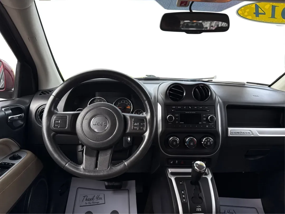 2014 Jeep Compass Latitude (1C4NJDEBXED) with an 2.4L I-4 DOHC engine, located at 1230 East Main St, Xenia, OH, 45385, (937) 908-9800, 39.688026, -83.910172 - **Discover Your Adventure with the 2014 Jeep Compass Latitude Perfect for Family Road Trips or Daily Commutes!**<br /> <br /> Are you ready to elevate your driving experience? The 2014 Jeep Compass Latitude is not just a vehicle; it's a lifestyle. Whether you're navigating busy city streets in Fair - Photo#21