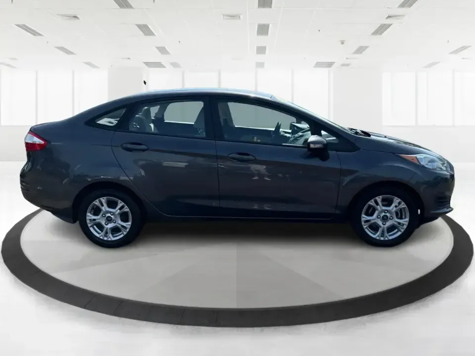 2015 Ford Fiesta SE (3FADP4BJ4FM) with an EcoBoost 1L I-3 gasoline direct injection engine, Automatic transmission, located at 8750 N County Rd 25A, Piqua, OH, 45356, (937) 908-9800, 40.164391, -84.232513 - **Discover Adventure and Style with the 2015 Ford Fiesta SE at Advantage Car and Credit in Fairborn, OH!**<br /> <br /> Are you ready to elevate your daily commute or weekend adventures? The 2015 Ford Fiesta SE is the ideal sedan for budget-conscious buyers seeking a reliable and stylish companion. - Photo#1