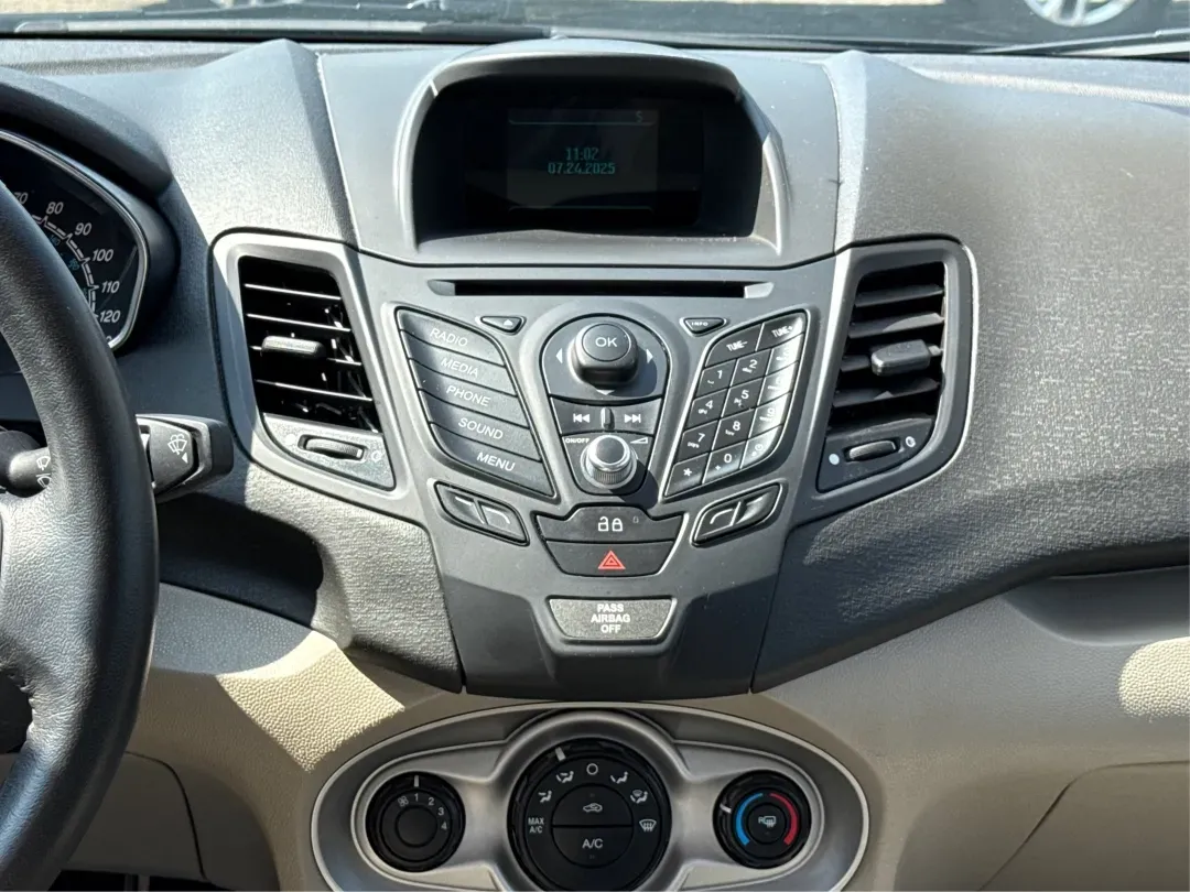 2015 Ford Fiesta SE (3FADP4BJ4FM) with an EcoBoost 1L I-3 gasoline direct injection engine, located at 8750 N County Rd 25A, Piqua, OH, 45356, (937) 908-9800, 40.164391, -84.232513 - **Discover Adventure and Style with the 2015 Ford Fiesta SE at Advantage Car and Credit in Fairborn, OH!**<br /> <br /> Are you ready to elevate your daily commute or weekend adventures? The 2015 Ford Fiesta SE is the ideal sedan for budget-conscious buyers seeking a reliable and stylish companion. - Photo#13