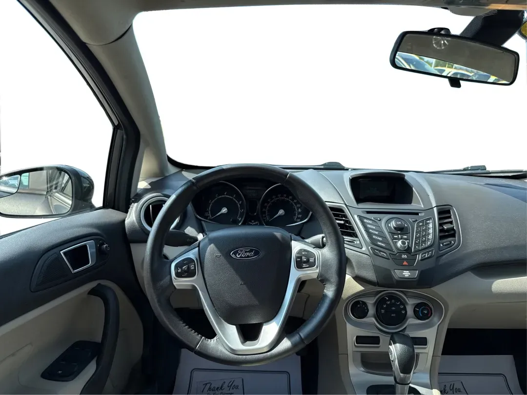 2015 Ford Fiesta SE (3FADP4BJ4FM) with an EcoBoost 1L I-3 gasoline direct injection engine, located at 8750 N County Rd 25A, Piqua, OH, 45356, (937) 908-9800, 40.164391, -84.232513 - **Discover Adventure and Style with the 2015 Ford Fiesta SE at Advantage Car and Credit in Fairborn, OH!**<br /> <br /> Are you ready to elevate your daily commute or weekend adventures? The 2015 Ford Fiesta SE is the ideal sedan for budget-conscious buyers seeking a reliable and stylish companion. - Photo#21