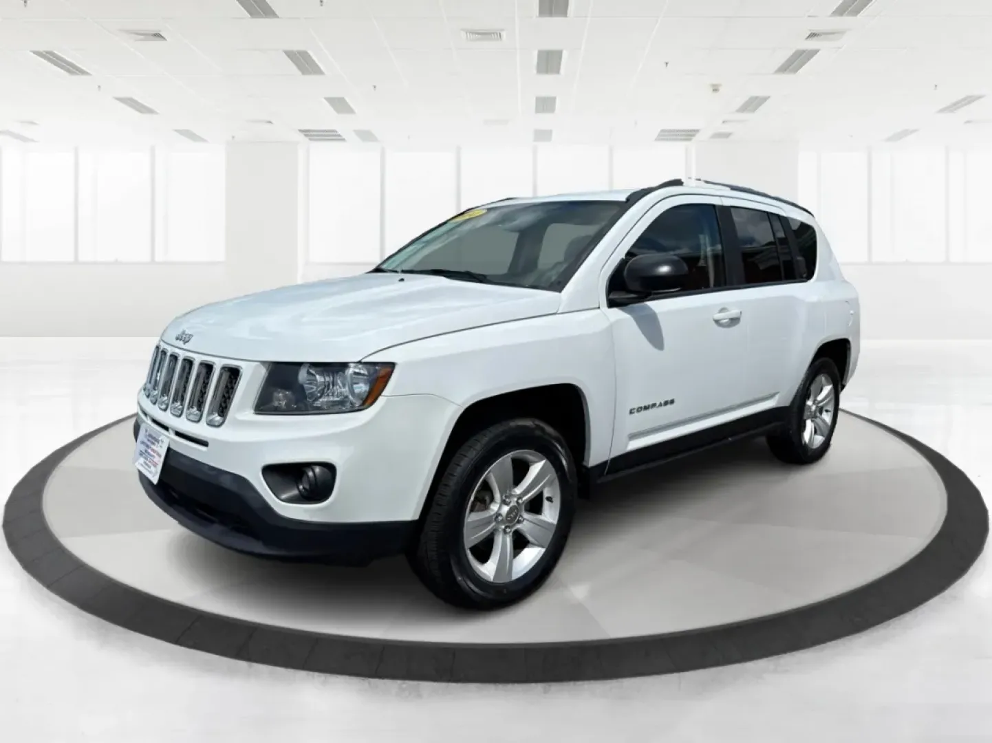 2014 Jeep Compass Sport (1C4NJDBB4ED) with an 2.4L I-4 DOHC engine, located at 1184 Kauffman Ave, Fairborn, OH, 45324, (937) 908-9800, 39.807072, -84.030914 - **Experience Adventure with the 2014 Jeep Compass Sport at Advantage Car and Credit Xenia!** <br /> <br /> Are you ready to embrace the open road with a vehicle that combines comfort, capability, and style? The 2014 Jeep Compass Sport, available at Advantage Car and Credit in Xenia, Ohio, is the pe - Photo#8