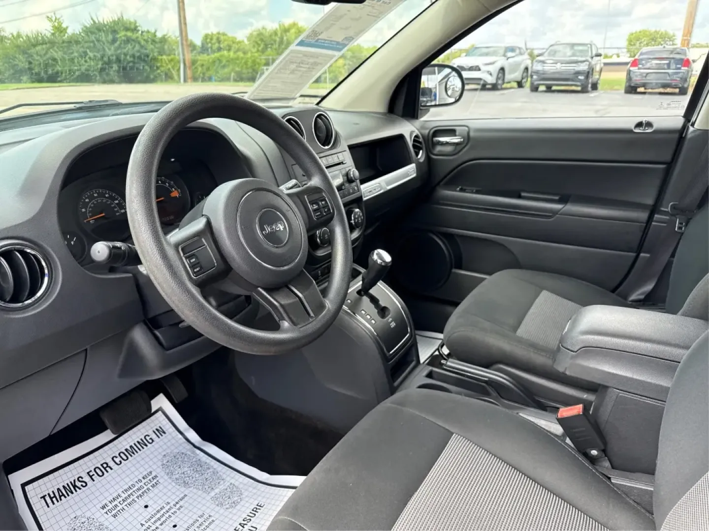 2014 Jeep Compass Sport (1C4NJDBB4ED) with an 2.4L I-4 DOHC engine, located at 1184 Kauffman Ave, Fairborn, OH, 45324, (937) 908-9800, 39.807072, -84.030914 - **Experience Adventure with the 2014 Jeep Compass Sport at Advantage Car and Credit Xenia!** <br /> <br /> Are you ready to embrace the open road with a vehicle that combines comfort, capability, and style? The 2014 Jeep Compass Sport, available at Advantage Car and Credit in Xenia, Ohio, is the pe - Photo#9