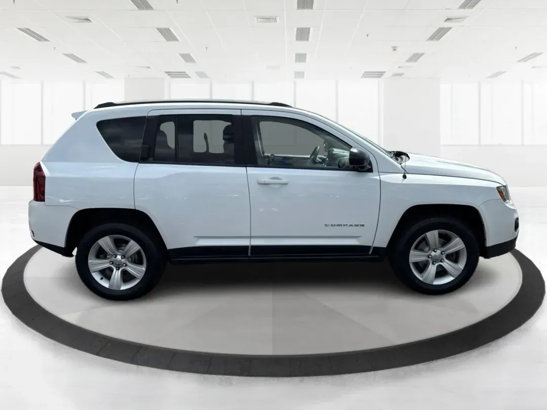 2014 Jeep Compass Sport (1C4NJDBB4ED) with an 2.4L I-4 DOHC engine, located at 1230 East Main St, Xenia, OH, 45385, (937) 908-9800, 39.688026, -83.910172 - 2014 Jeep Compass Sport - Photo#1