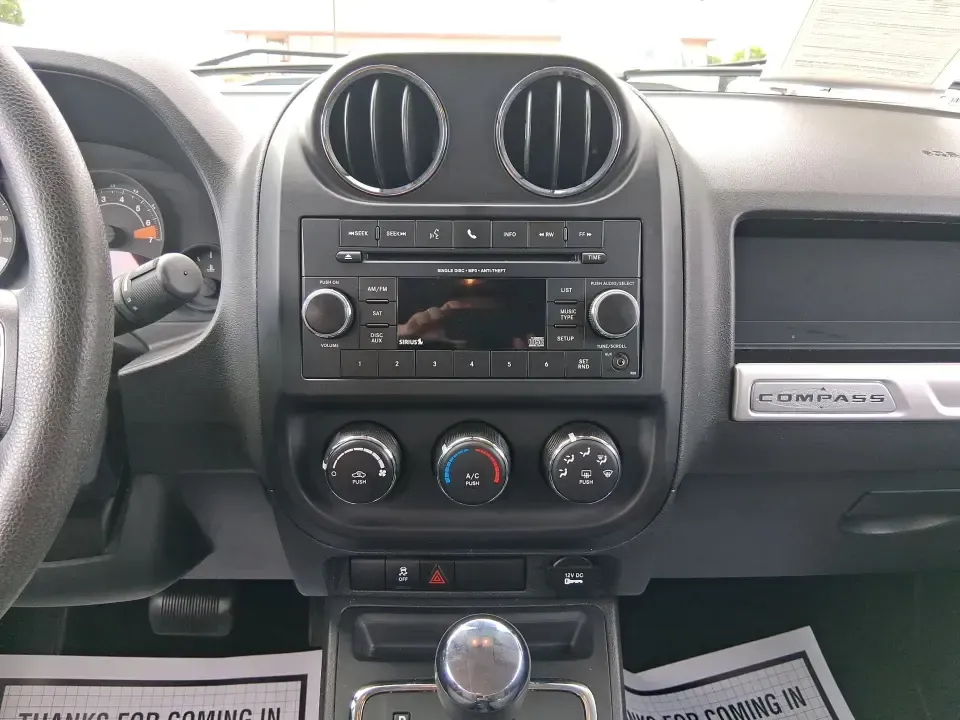 2014 Jeep Compass Sport (1C4NJDBB4ED) with an 2.4L I-4 DOHC engine, Automatic transmission, located at 1230 East Main St, Xenia, OH, 45385, (937) 908-9800, 39.688026, -83.910172 - **Experience Adventure with the 2014 Jeep Compass Sport at Advantage Car and Credit Xenia!** <br /> <br /> Are you ready to embrace the open road with a vehicle that combines comfort, capability, and style? The 2014 Jeep Compass Sport, available at Advantage Car and Credit in Xenia, Ohio, is the pe - Photo#13