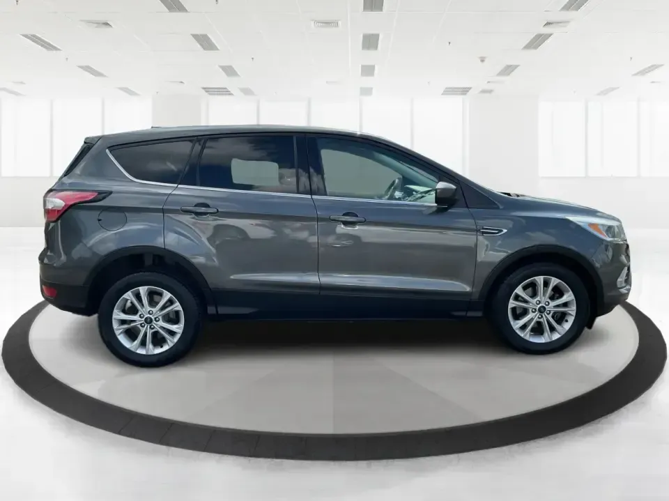 2017 Ford Escape SE (1FMCU0GD7HU) with an 1.5L L4 DOHC 16V engine, 6A transmission, located at 1099 N County Rd 25A, Troy, OH, 45373, (937) 908-9800, 40.057079, -84.212883 - **Experience Life on the Move with the 2017 Ford Escape SE at Advantage Car and Credit - Troy!**<br /> <br /> Are you ready to elevate your lifestyle with a versatile SUV that's perfect for family outings and weekend adventures? Look no further than the 2017 Ford Escape SE, available at Advantage Ca - Photo#1
