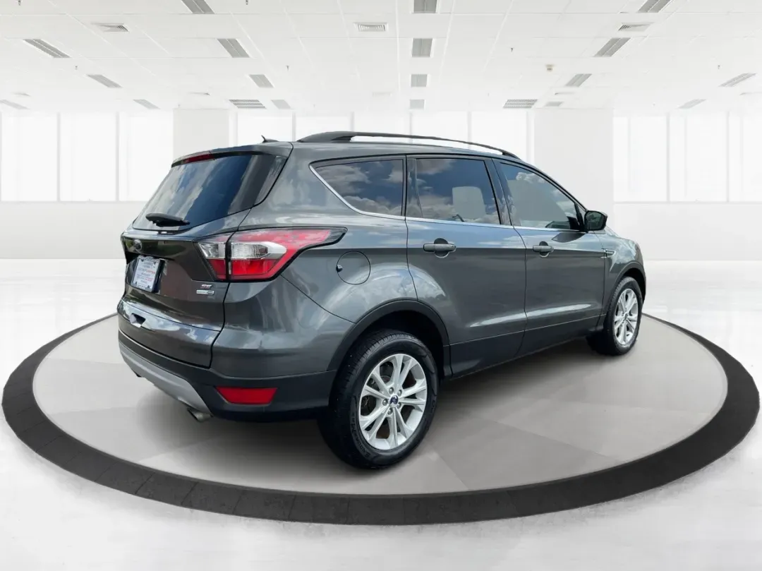 2017 Ford Escape SE (1FMCU9GD7HU) with an Other engine, located at 4508 South Dixie Dr, Moraine, OH, 45439, (937) 908-9800, 39.689976, -84.218452 - **Adventure Awaits With This 2017 Ford Escape SE! Perfect for Your Next Journey!**<br /> <br /> Are you ready to elevate your weekend getaways or daily commutes? The 2017 Ford Escape SE is the ideal SUV for those who crave versatility without sacrificing style. With a spacious interior, advanced saf - Photo#2