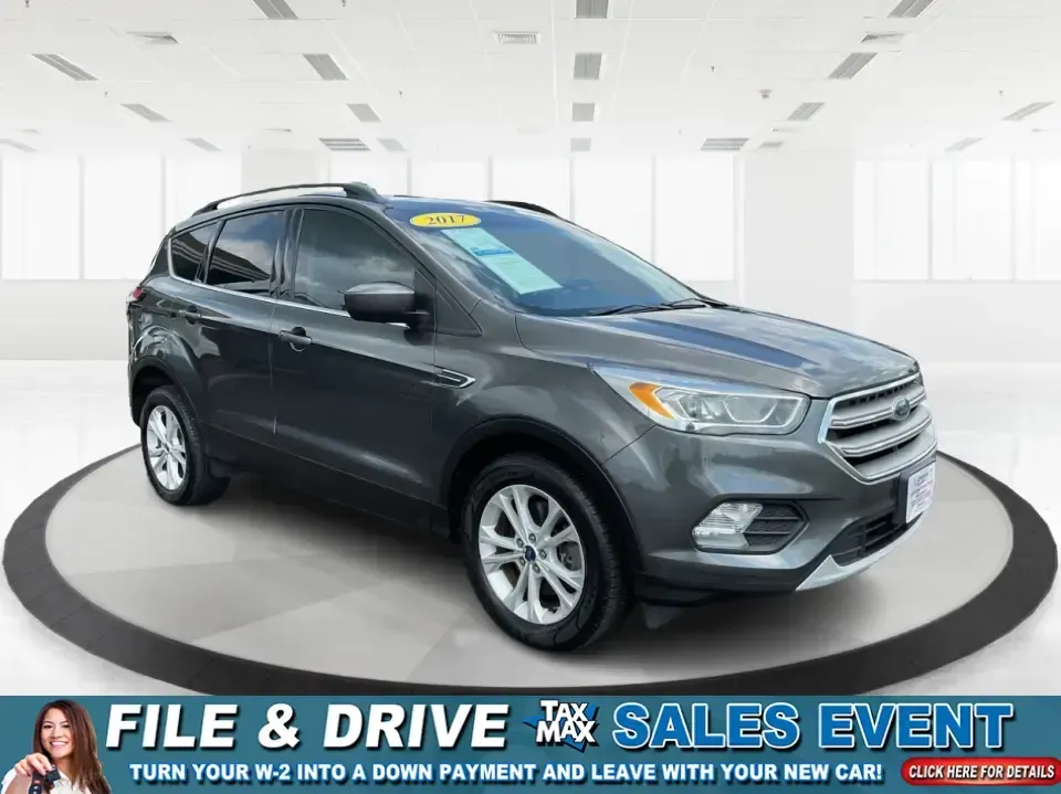 2017 Ford Escape SE (1FMCU9GD7HU) with an 1.5L L4 DOHC 16V engine, 6A transmission, located at 4508 South Dixie Dr, Moraine, OH, 45439, (937) 908-9800, 39.689976, -84.218452 - **Adventure Awaits With This 2017 Ford Escape SE! Perfect for Your Next Journey!**<br /> <br /> Are you ready to elevate your weekend getaways or daily commutes? The 2017 Ford Escape SE is the ideal SUV for those who crave versatility without sacrificing style. With a spacious interior, advanced saf - Photo#0