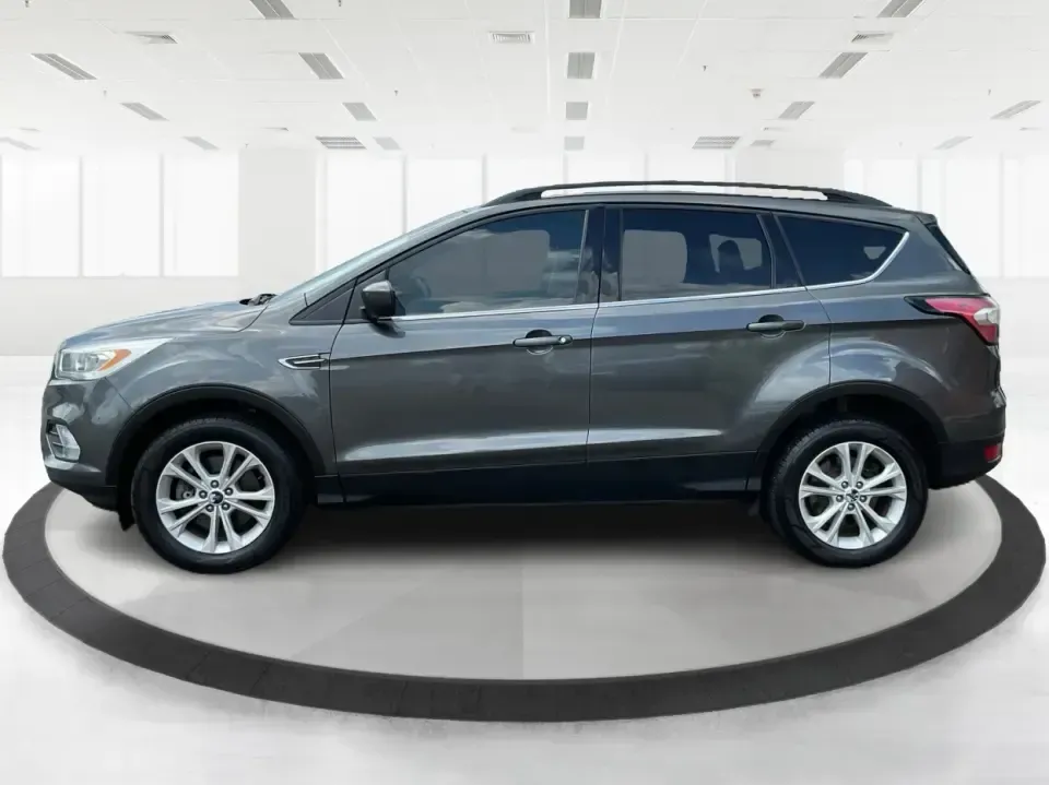 2017 Ford Escape SE (1FMCU9GD7HU) with an 1.5L L4 DOHC 16V engine, 6A transmission, located at 4508 South Dixie Dr, Moraine, OH, 45439, (937) 908-9800, 39.689976, -84.218452 - **Adventure Awaits With This 2017 Ford Escape SE! Perfect for Your Next Journey!**<br /> <br /> Are you ready to elevate your weekend getaways or daily commutes? The 2017 Ford Escape SE is the ideal SUV for those who crave versatility without sacrificing style. With a spacious interior, advanced saf - Photo#5