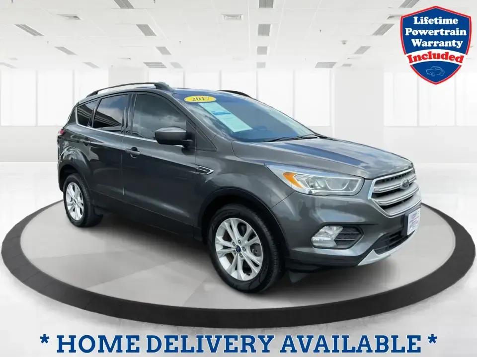 2017 Ford Escape SE (1FMCU9GD7HU) with an 1.5L L4 DOHC 16V engine, 6A transmission, located at 4508 South Dixie Dr, Moraine, OH, 45439, (937) 908-9800, 39.689976, -84.218452 - **Adventure Awaits With This 2017 Ford Escape SE! Perfect for Your Next Journey!**<br /> <br /> Are you ready to elevate your weekend getaways or daily commutes? The 2017 Ford Escape SE is the ideal SUV for those who crave versatility without sacrificing style. With a spacious interior, advanced saf - Photo#0