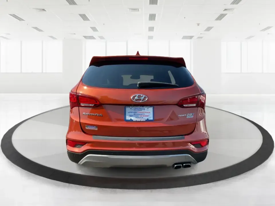 2017 Hyundai Santa Fe 2.0T Ultimate (5XYZW4LA5HG) with an Theta II 2L I-4 gasoline direct injection engine, 6A transmission, located at 1951 S Dayton Lakeview Rd., New Carlisle, OH, 45344, (937) 908-9800, 39.890999, -84.050255 - Are you ready to elevate your family adventures or commute comfortably while tackling any road with confidence? Look no further than this 2017 Hyundai Santa Fe 2.0T Ultimate, available now at Advantage Car and Credit in Fairborn, OH. This SUV is not just a vehicle; it's your ticket to creating unfor - Photo#3