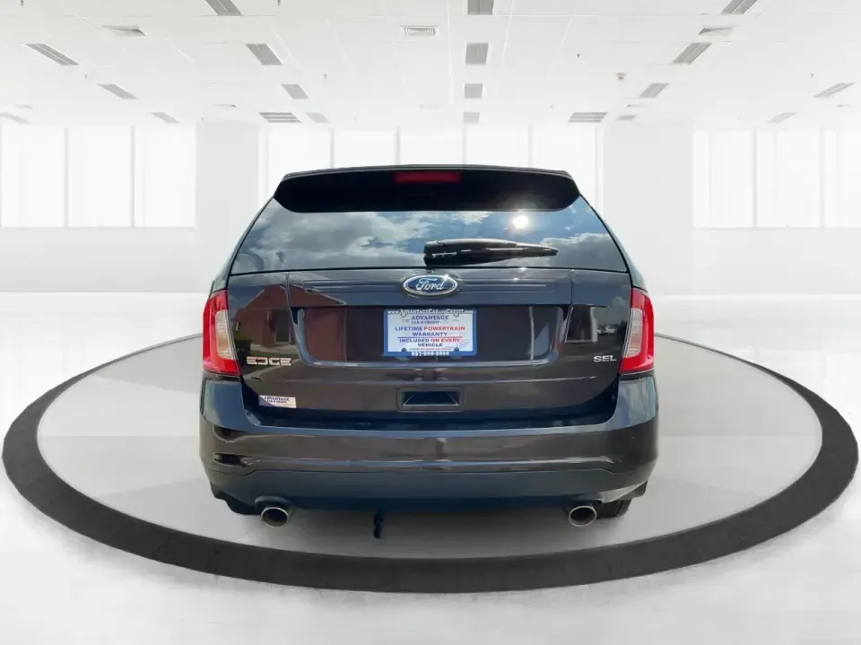 2013 Ford Edge SEL (2FMDK3JC0DB) with an 3.5L V6 DOHC 24V engine, 6-Speed Automatic transmission, located at 1951 S Dayton Lakeview Rd., New Carlisle, OH, 45344, (937) 908-9800, 39.890999, -84.050255 - **Explore New Horizons with the 2013 Ford Edge SEL Your Adventure Awaits!**<br /> <br /> Are you ready to elevate your daily commute or embark on weekend adventures with friends and family? The 2013 Ford Edge SEL is the versatile SUV that perfectly balances style, comfort, and capability, making it - Photo#3