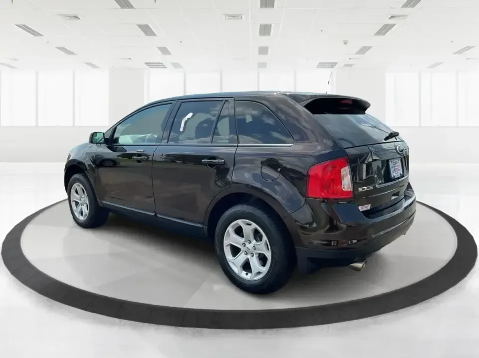 2013 Ford Edge SEL (2FMDK3JC0DB) with an 3.5L V6 DOHC 24V engine, 6-Speed Automatic transmission, located at 1951 S Dayton Lakeview Rd., New Carlisle, OH, 45344, (937) 908-9800, 39.890999, -84.050255 - **Explore New Horizons with the 2013 Ford Edge SEL Your Adventure Awaits!**<br /> <br /> Are you ready to elevate your daily commute or embark on weekend adventures with friends and family? The 2013 Ford Edge SEL is the versatile SUV that perfectly balances style, comfort, and capability, making it - Photo#4