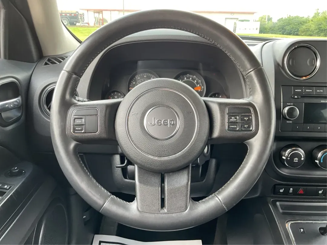 2014 Jeep Patriot Latitude (1C4NJPFA4ED) with an Other engine, located at 1099 N County Rd 25A, Troy, OH, 45373, (937) 908-9800, 40.057079, -84.212883 - **Adventure Awaits with This 2014 Jeep Patriot Latitude at Advantage Car and Credit - Moraine!**<br /> <br /> Are you ready to embark on new adventures, whether it's a weekend getaway, a family road trip, or daily commutes? This 2014 Jeep Patriot Latitude is your perfect companion for all these scen - Photo#15