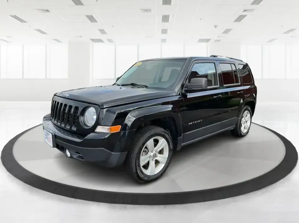 2014 Jeep Patriot Latitude (1C4NJPFA4ED) with an 2.0L L4 DOHC 16V engine, Automatic transmission, located at 880 E. National Road, Vandalia, OH, 45377, (937) 908-9800, 39.891918, -84.183594 - **Adventure Awaits with This 2014 Jeep Patriot Latitude at Advantage Car and Credit - Moraine!**<br /> <br /> Are you ready to embark on new adventures, whether it's a weekend getaway, a family road trip, or daily commutes? This 2014 Jeep Patriot Latitude is your perfect companion for all these scen - Photo#8