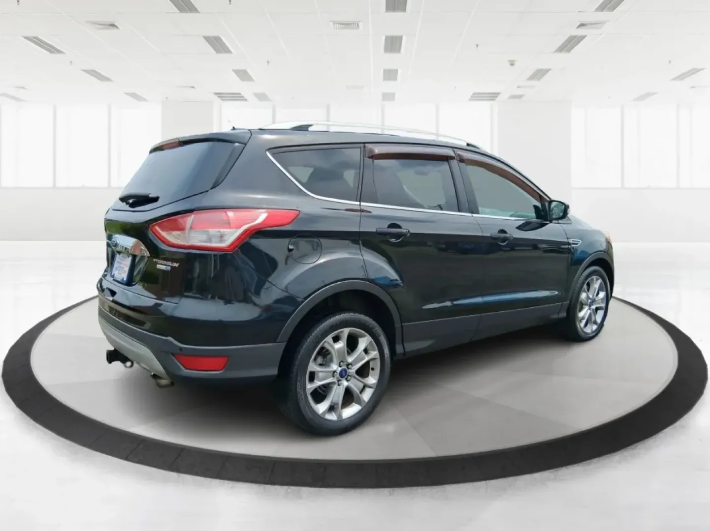 2014 Ford Escape Titanium (1FMCU9J96EU) with an EcoBoost 1.6L I-4 gasoline direct injection engine, located at 4508 South Dixie Dr, Moraine, OH, 45439, (937) 908-9800, 39.689976, -84.218452 - **Unleash Adventure with the 2014 Ford Escape Titanium: Your Ideal Family SUV!**<br /> <br /> Are you ready to take on the open road for your next family getaway or weekend adventure? Look no further than the 2014 Ford Escape Titanium, a versatile SUV that combines style, comfort, and functionality, - Photo#2