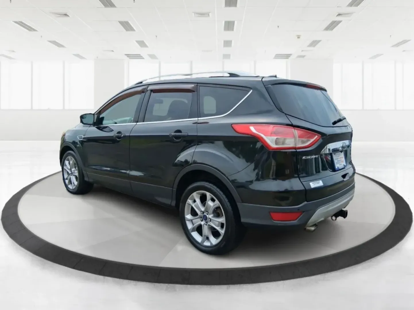 2014 Ford Escape Titanium (1FMCU9J96EU) with an EcoBoost 1.6L I-4 gasoline direct injection engine, located at 4508 South Dixie Dr, Moraine, OH, 45439, (937) 908-9800, 39.689976, -84.218452 - **Unleash Adventure with the 2014 Ford Escape Titanium: Your Ideal Family SUV!**<br /> <br /> Are you ready to take on the open road for your next family getaway or weekend adventure? Look no further than the 2014 Ford Escape Titanium, a versatile SUV that combines style, comfort, and functionality, - Photo#4