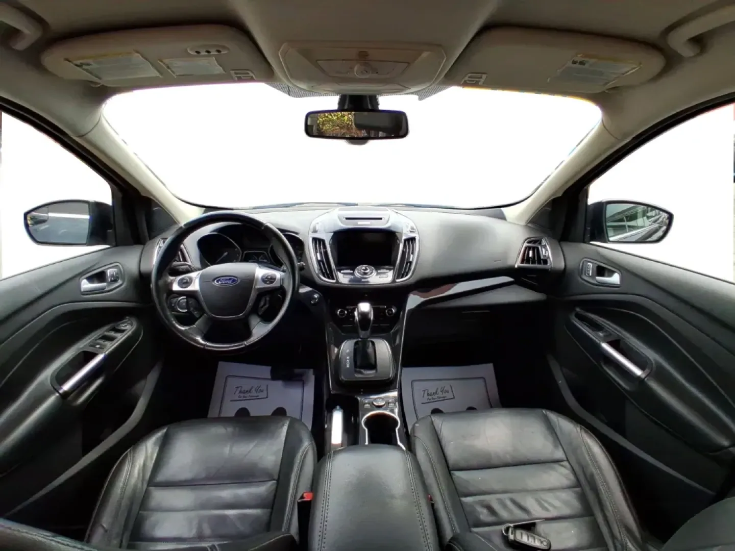 2014 Ford Escape Titanium (1FMCU9J96EU) with an EcoBoost 1.6L I-4 gasoline direct injection engine, located at 4508 South Dixie Dr, Moraine, OH, 45439, (937) 908-9800, 39.689976, -84.218452 - **Unleash Adventure with the 2014 Ford Escape Titanium: Your Ideal Family SUV!**<br /> <br /> Are you ready to take on the open road for your next family getaway or weekend adventure? Look no further than the 2014 Ford Escape Titanium, a versatile SUV that combines style, comfort, and functionality, - Photo#21