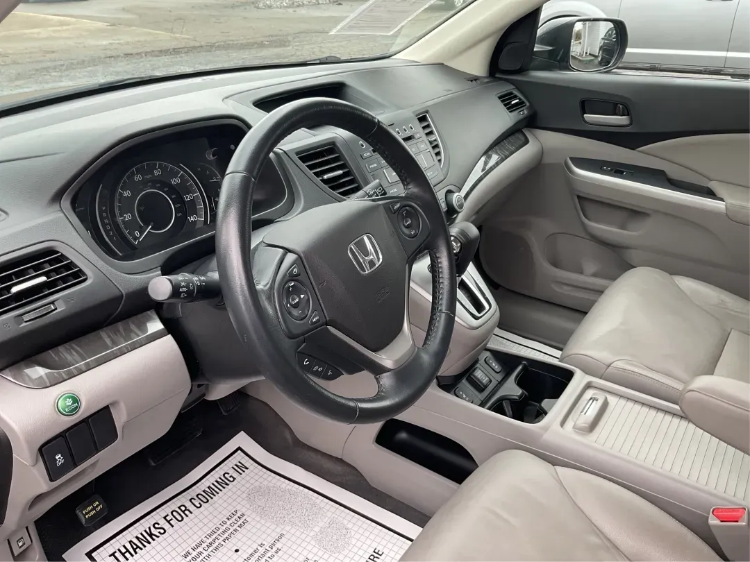 2012 Honda CR-V EX-L 4WD 5-Speed AT (2HKRM3H75CH) with an Other engine, located at 1099 N County Rd 25A, Troy, OH, 45373, (937) 908-9800, 40.057079, -84.212883 - Are you ready to elevate your adventures and daily commutes with a reliable vehicle? The 2012 Honda CR-V EX-L is perfect for individuals and families alike, offering a comfortable ride with ample space and versatile features. Whether you're navigating the bustling streets of Fairborn, OH, or heading - Photo#9